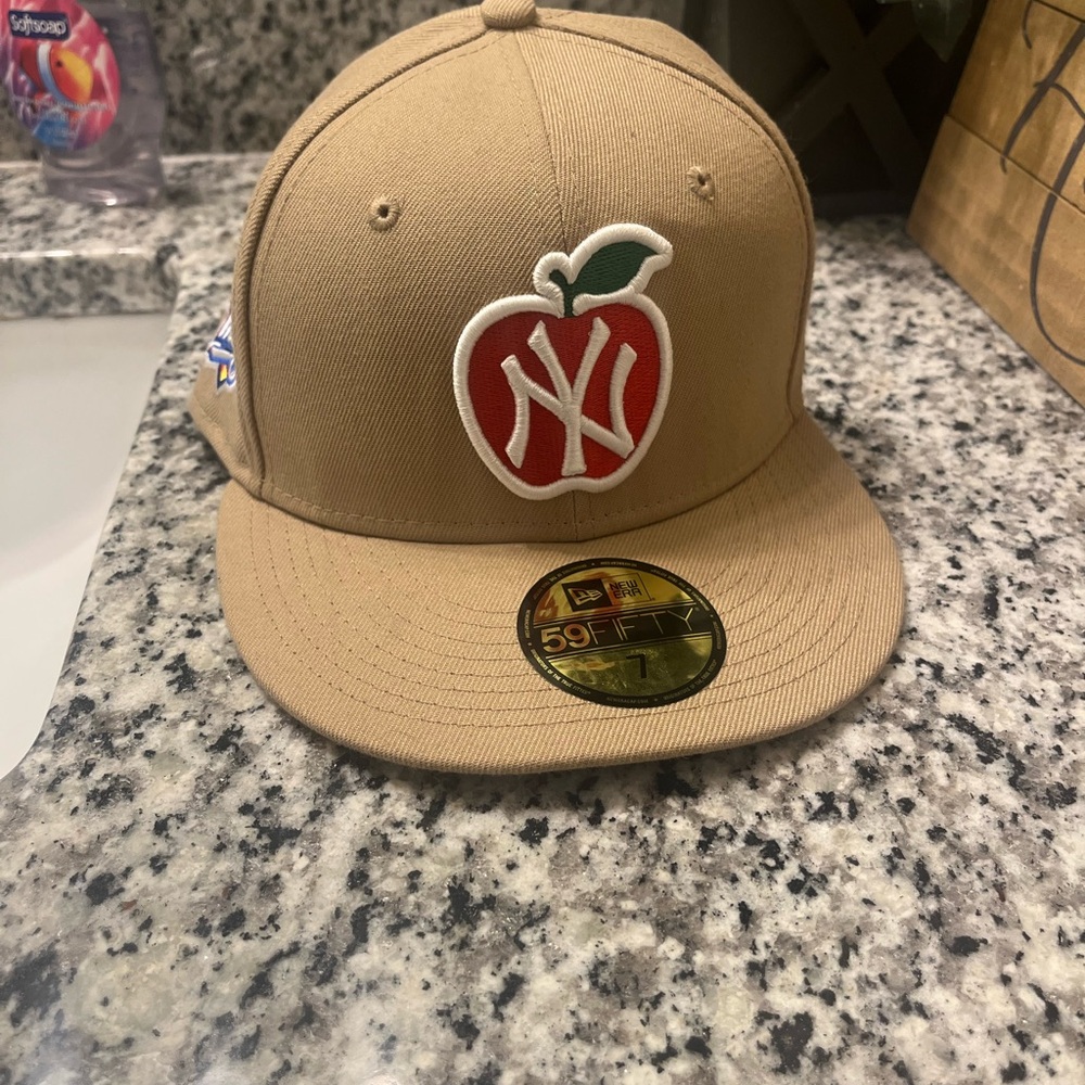 New Era Tan Cap with Red Apple Logo
